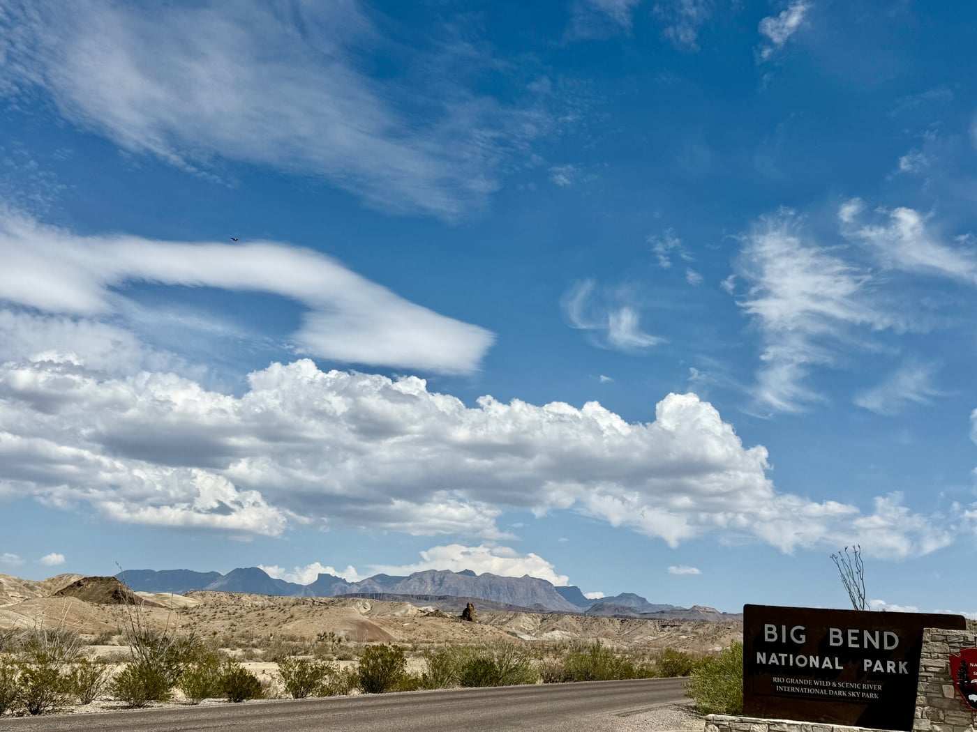The Chisos Mountains ridgeline rising into a deep blue sky at the entrance to Big Bend National Park