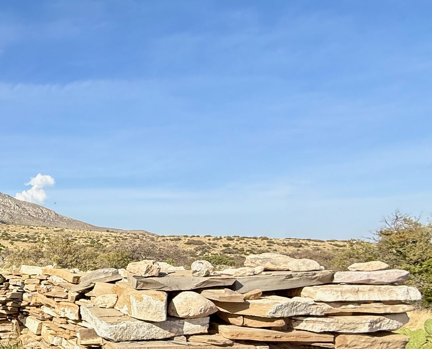Pinery Butterfield Stage Station ruins, stone foundations under blue sky at Guadalupe Mountains
