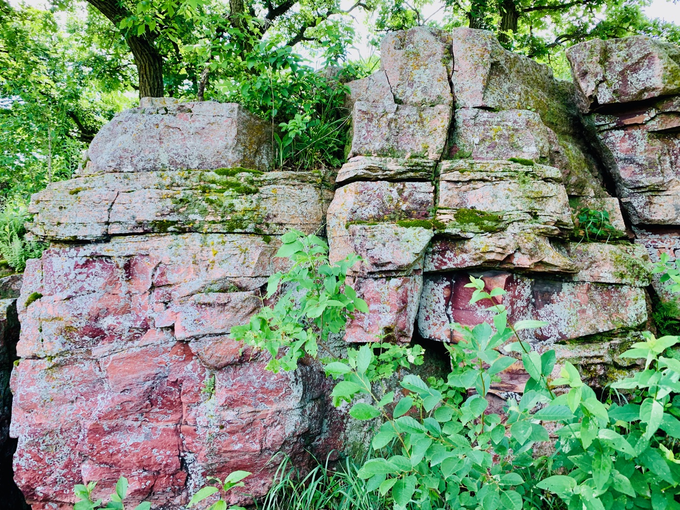 A close look at the layered red catlinite — the sacred pipestone, soft enough to carve