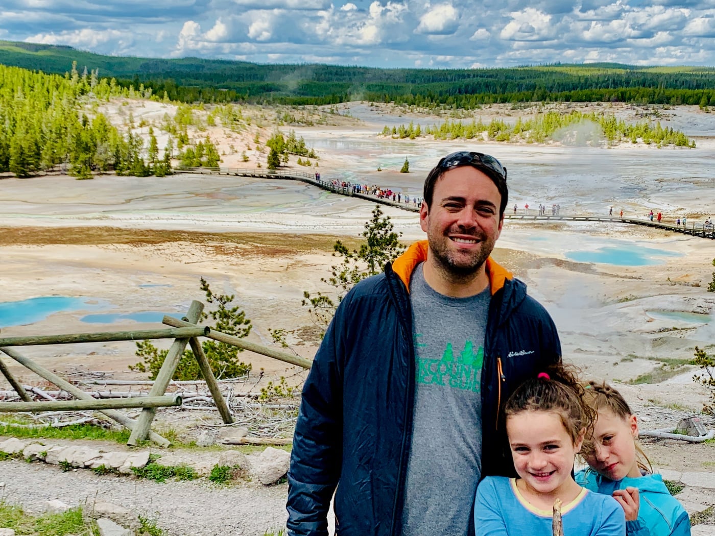 Sprinterdad and the girls above a steaming hydrothermal basin and its fumaroles